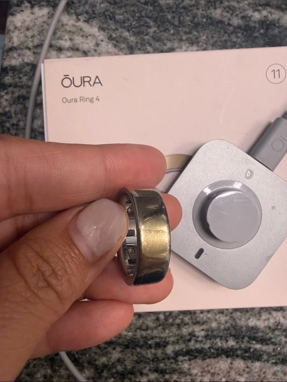 Oura Gold Ring Size 11 & Silver Charging Dock with Gray Cable